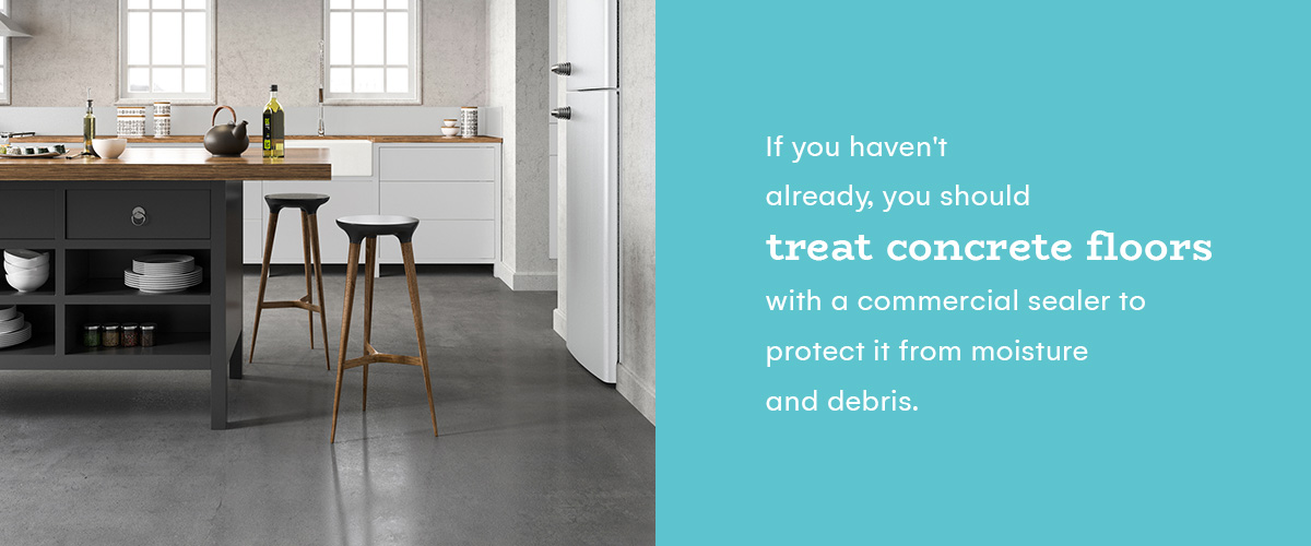 treat concrete floors with a commercial sealer to protect it from moisture
